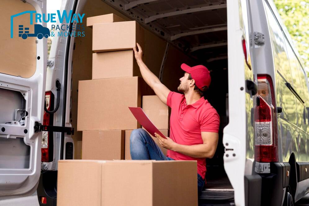 Low angle delivery man with package list 23 2148590677 (1)