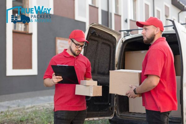 Front view delivery man with packagaes 23 2148684703 (1)